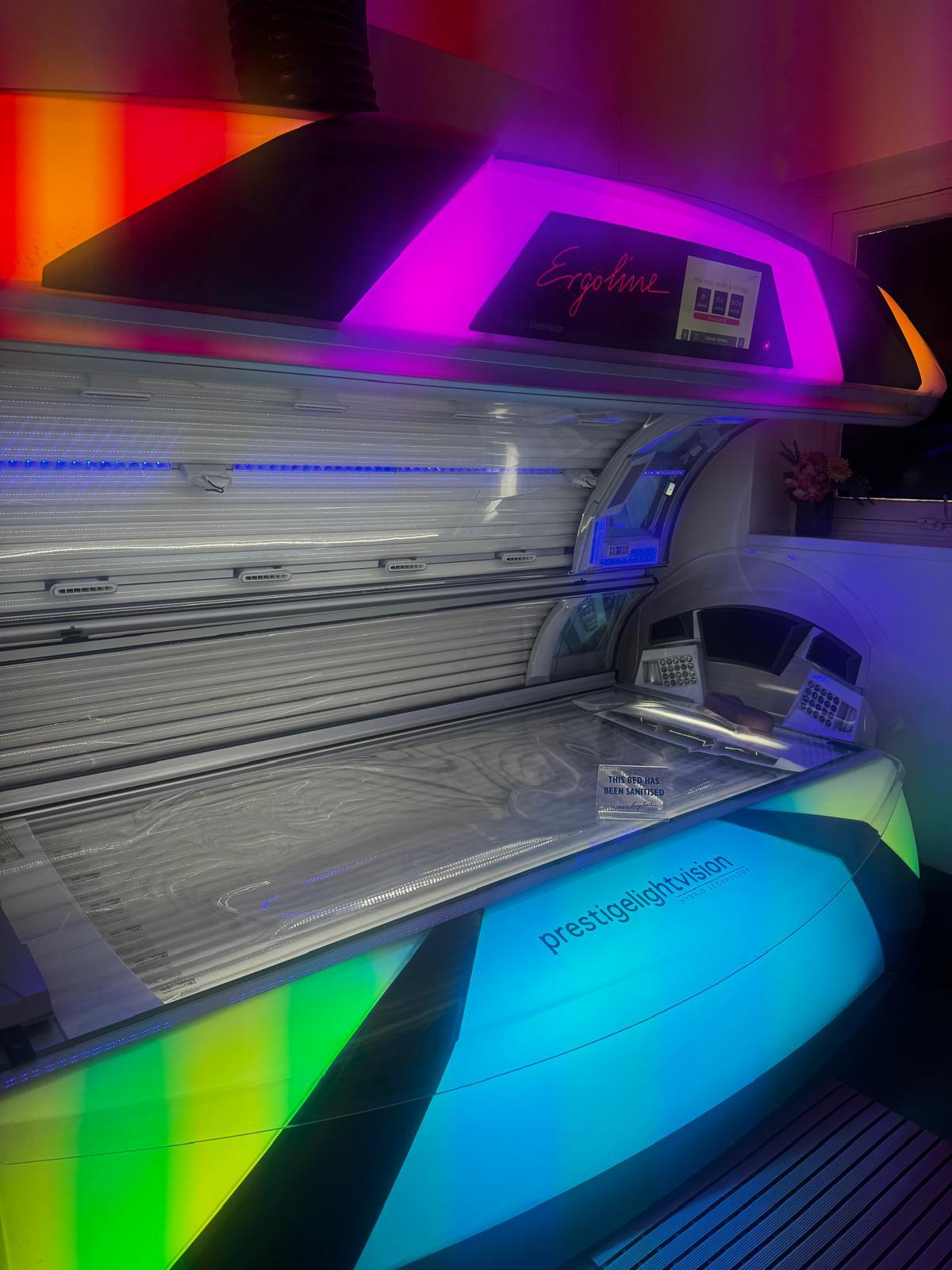 Ergoline Prestige Light Vision sunbed glowing